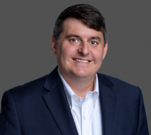 Pictured: Baxter Webb via Vanderbilt Business headshot.