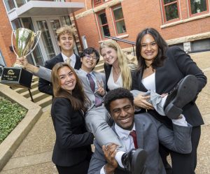 Pictured: Vanderbilt Business Accelerator Summer Business Immersion students pose with a trophy after winning the Mars challenge.