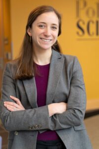 Headshot of Shelby Shumard with her arms crossed