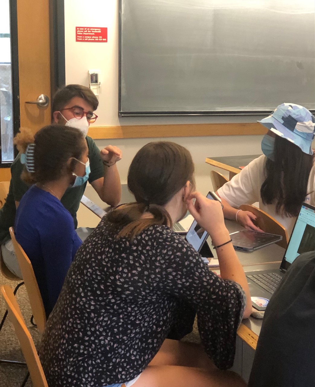 Students in class talking.