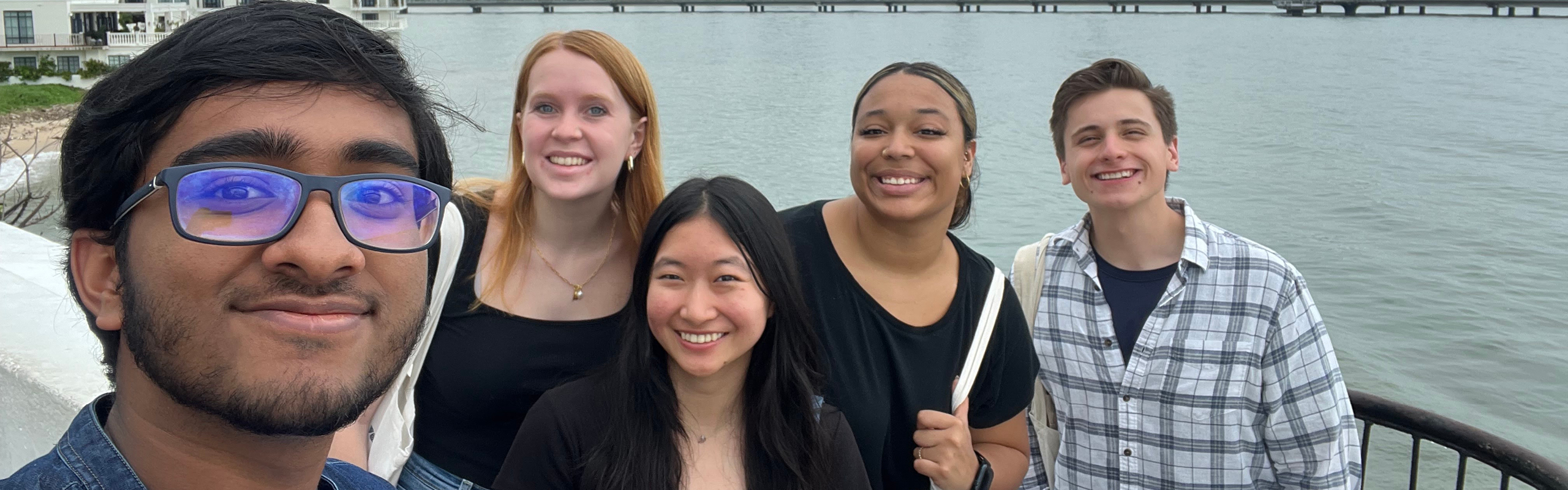 Students taking a selfie by the waterside in Panama