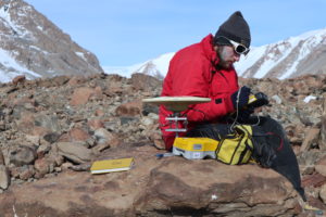 Andrew Grant (VU '19) records the GPS location of a boulder in Ong Valley, 2017.