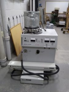 Vacuum depositer and old laser