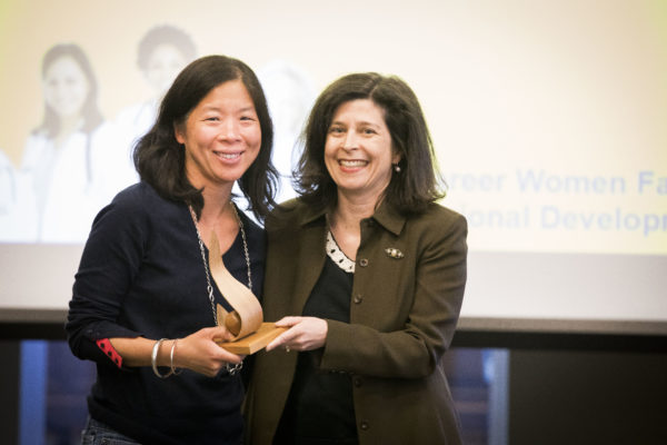 Women's Center Director Rory Dicker presents the Mentoring Award to Cindy Kam, William R. Kenan, Jr. Professor of Political Science. (Susan Urmy/Vanderbilt)