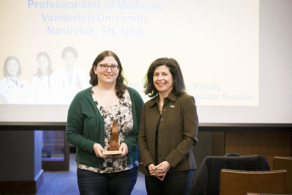 Women's Center Director Rory Dicker presents the Margaret Cuninggim Women's Center Leadership Award to Jessamyn Perimutter, a Ph.D. student in the Department of Biological Sciences. (Susan Urmy/Vanderbilt)