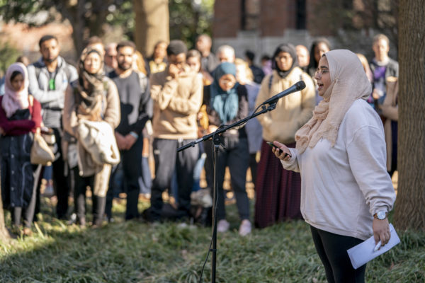 Student Shun Ahmed reads a poem she wrote in reaction to the New Zealand terror attacks at two mosques.