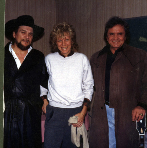 standing left to right, Waylon Jennings, Marshall Chapman and Johnny Cash 