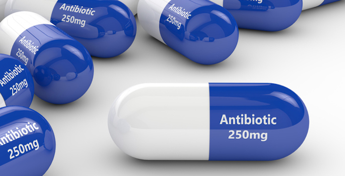 3d rendering of antibiotic pills over white background