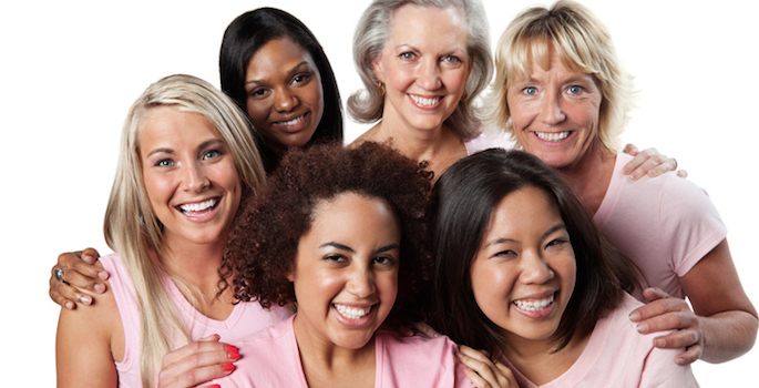 Diverse group of women wearing pink representing breast cancer survival