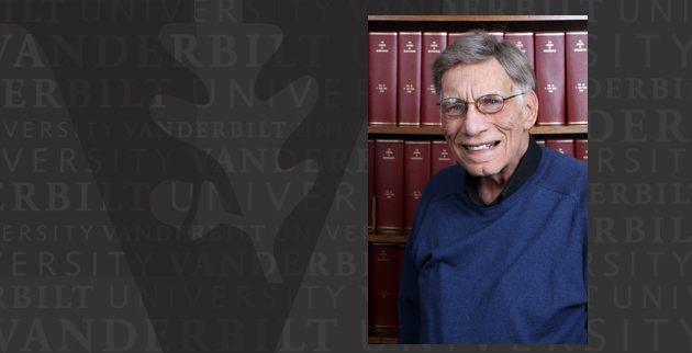 photo of Robert Fox, professor of psychology, emeritus, in front of bookcase (Steve Green/Vanderbilt University)