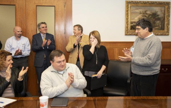 Cheryl Bates is surprised with the Chancellor's Heart and Soul Staff Appreciatioon Award at an Owen Executive Education staff meeting 