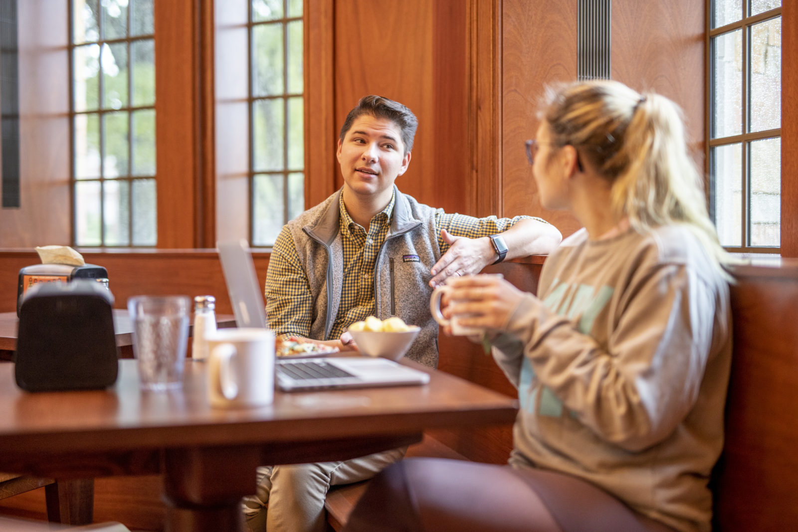Danny Coradazzi meets with students in the dining room of E. Bronson Ingram College.
