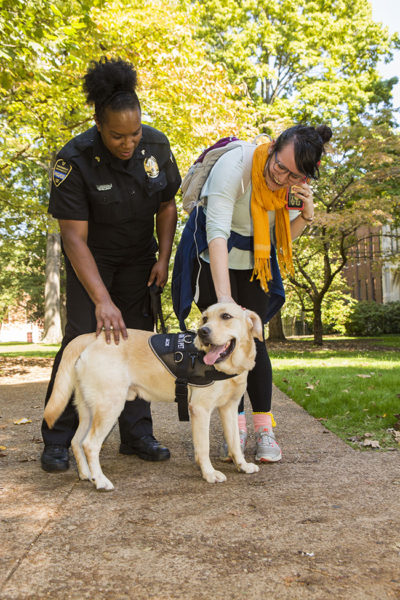 Community K-9 patrol officer "Jack" with his handler, Cpl. Shaneithia Lewis. (Anne Rayner/Vanderbilt)