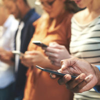 Shot of a diverse group of people social networking outside