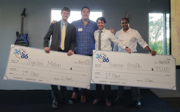 Vanderbilt teams pose with their giant checks at the 36|86 Student Edition pitch competition. From left: Harrison Bartlett; team adviser Robert Grajewski, Evans Family Executive Director of the Wond’ry; Pedro Teixeira and Ravi Atreya. (Submitted photo)