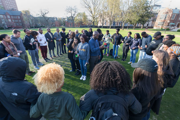 Students, faculty and staff gathered Wednesday evening to mark the 50th anniversary of the assassination of Dr. Martin Luther King Jr. They formed a unity circle and shared a moment of silence at 6:01 p.m., the time of the shooting on April 4, 1968, then joined in a nationwide ringing of bells 39 times to mark each year of King's life. (Joe Howell/Vanderbilt)