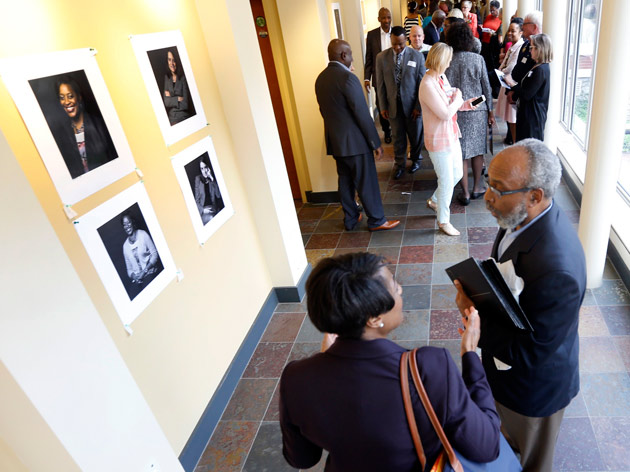 Visitors to the Bishop Joseph Johnson Black Cultural Center get their first looks at Vanderbilt Pioneers portraits. (Steve Green/Vanderbilt)