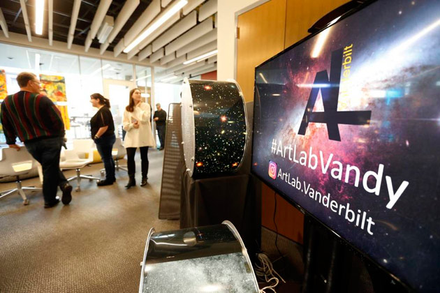 An ArtLab pop-up exhibition included "Pinpoints," created by David Weintraub to track stars. (Steve Green/Vanderbilt)