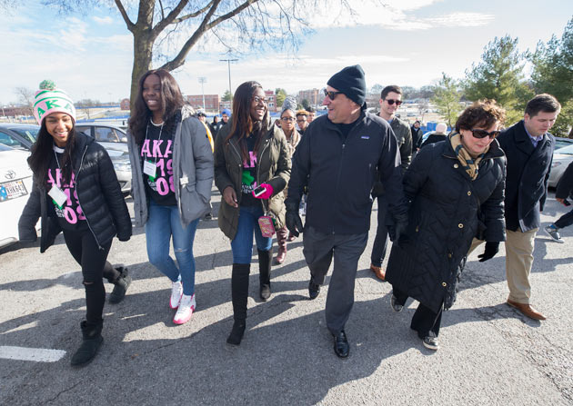 Chancellor Nicholas S. Zeppos and wife Lydia Howarth walk with students during the Nashville Freedom March Jan. 15. (Joe Howell/Vanderbilt)