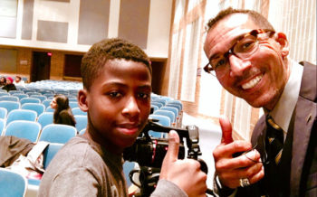 L-r: One of the young men who was inspired by Gilman Whiting at a Chicago school district symposium on addressing the achievement gap among black and Latino boys. Whiting gave the symposium's keynote address. (courtesy of Gilman Whiting)