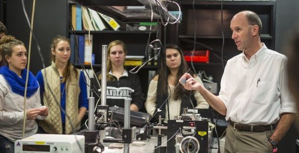 Jansen with students in lab