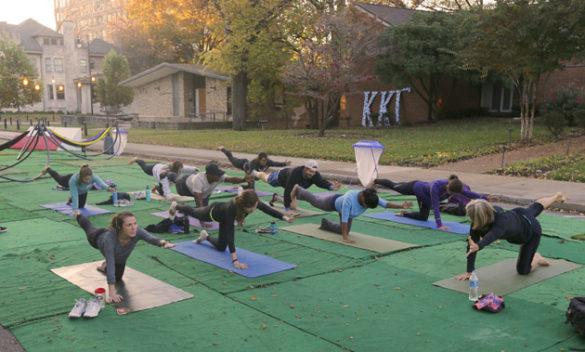 The Vanderbilt Recreation and Wellness Center sponsored a yoga class at the pop-up park on Kensington Place. (Steve Green/Vanderbilt)