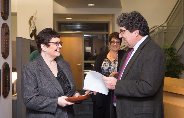 Chancellor Nicholas S. Zeppos presents Carol Wiley, grant manager for the Department of Biological Sciences, with the Chancellor's Heart and Soul Staff Appreciation Award Nov. 8. (Susan Urmy/Vanderbilt)
