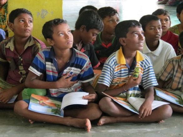 Students in Bangladesh listen to a classroom lesson based on "Farzana's Journey." (Submitted photo/Chelsea Peters)