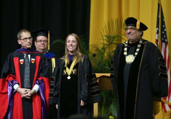 Vanderbilt Law School Dean Chris Guthrie, Founder's Medalist Laura Dolbow and Chancellor Nicholas S. Zeppos. (Joe Howell/Vanderbilt)