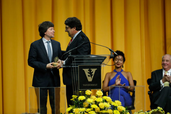 Chancellor Nicholas S. Zeppos awards filmmaker Ken Burns the Nichols-Chancellor's Medal May 11 in Memorial Gym. (Daniel Dubois/Vanderbilt)