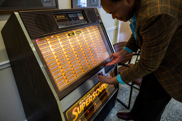 Stambaugh House faculty head Alice Randall and her husband, David Ewing (pictured here), assembled the jukebox last summer, scouring warehouses throughout rural Middle Tennessee for discarded but still playable 45-rpm singles. (Joe Buglewicz/Vanderbilt)