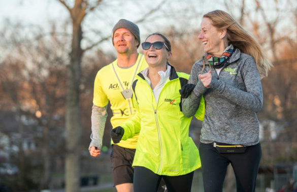 Peabody College senior Stephanie Zundel (center) on a run with her Achilles International training partners Harvey Freeman and Amy Harris. (John Russell/Vanderbilt)