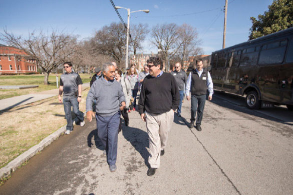 Fisk history professor Reavis Mitchell walks with Chancellor Nicholas S. Zeppos as the group prepares to tour Fisk's Memorial Chapel. (Vanderbilt University)