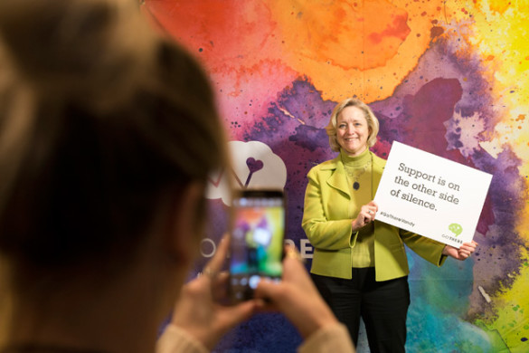 Provost and Vice Chancellor for Academic Affairs Susan R. Wente poses for a photo at the selfie station at the GO THERE campaign kickoff Jan. 27. (Joe Howell/Vanderbilt)