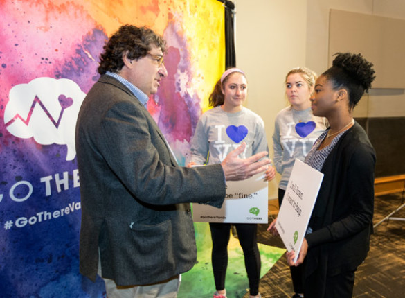Chancellor Nicholas S. Zeppos (far left) speaks with students at the GO THERE campaign kickoff at the Student Life Center Jan. 27. (Joe Howell/Vanderbilt)