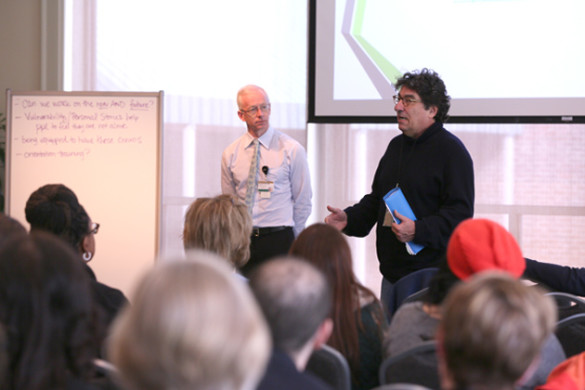 Donald Brady (left), co-chair of the Chancellor’s Strategic Planning Committee on Mental Health and Wellbeing, and Chancellor Nicholas S. Zeppos (right) speak at the Chancellor's Town Hall meeting Jan. 26. (Vanderbilt University)