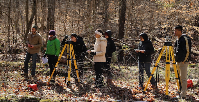 3-28-2015 - Location photos of Prof. David Furbish's EES 260 geomorphology class field trip to Montgomery Bell State Park. Students out in the creek with equipment surveying river bed profiles and getting chilly & wet. (Vanderbilt University / Steve Green)