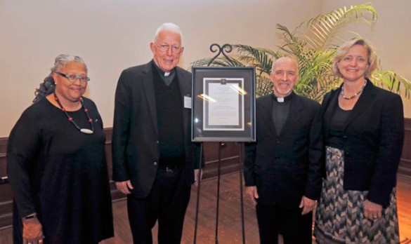 L-r: Dean Emilie Townes, honoree Edward "Monk" Malloy, Bruce Morrill and Provost Susan R. Wente. (Steve Green/Vanderbilt)