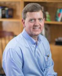 photo of David Wright sitting in office by John Russell of Vanderbilt University