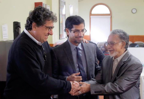 At the Islamic Center of Nashville, Chancellor Nicholas S. Zeppos talks with center president Rashed Fakruddin and Fakruddin's father as part of the Nov. 5 Chancellor Charter interfaith tour. (Steve Green/Vanderbilt)