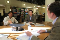 MBA students confer on a project in the Walker Management Library at the Owen School. (Daniel Dubois / Vanderbilt)