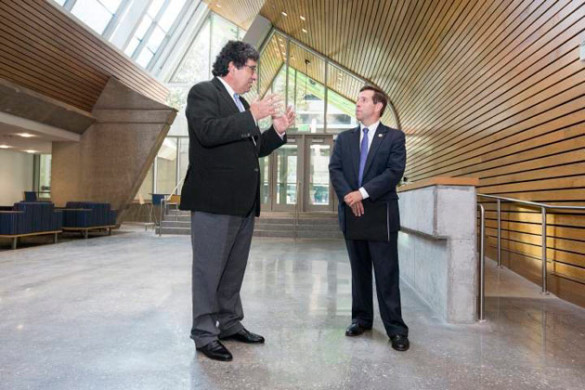 Chancellor Nicholas S. Zeppos greets U.S. Rep. Chuck Fleischmann in the new Engineering and Science Building. (Joe Howell/Vanderbilt)