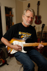 Gordon Logan playing electric guitar