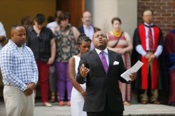 James Dennis, MDiv’16, was among students, faculty and staff taking part in a vigil outside Benton Chapel in 2014 in response to the racial violence of Ferguson and other events that summer. (John Russell/Vanderbilt University)