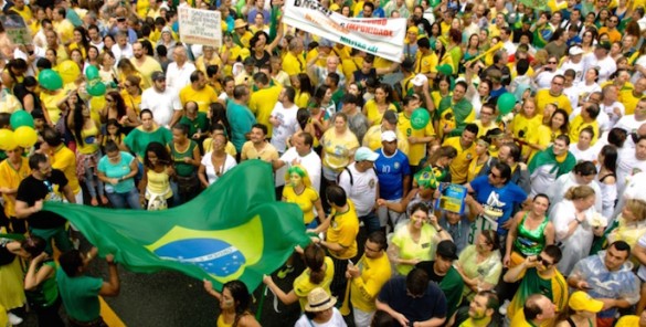 protestors waving brazilian flags