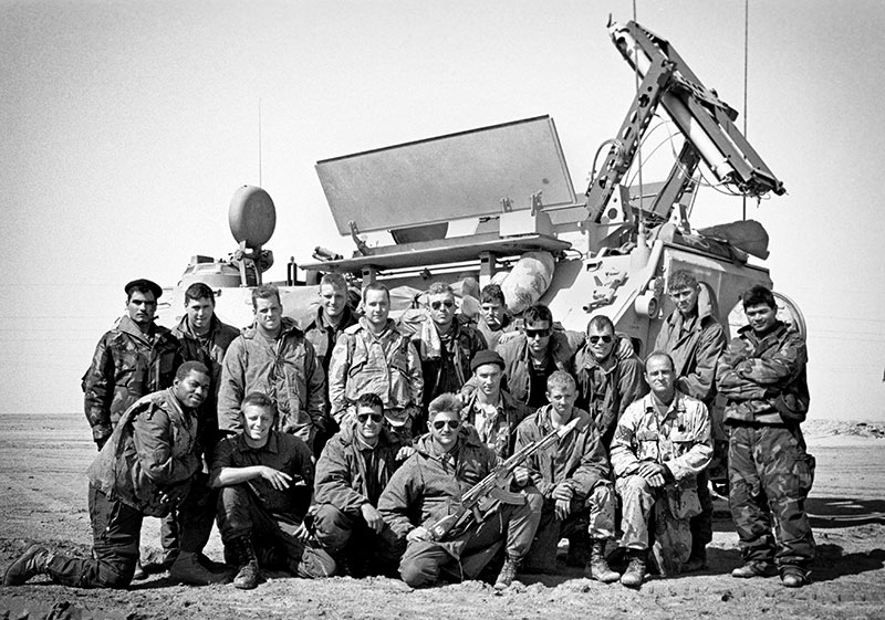 Vanderbilt photographer Joe Howell (front row, second from left) and his fellow Marines were part of the initial breaching teams that cleared minefields along the Kuwaiti border. (Photo by Joe Howell)