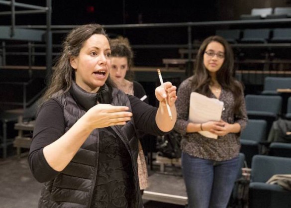 director and students rehearse