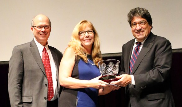 Chancellor Nicholas S. Zeppos (right) recognizes Commodore Award winner Judy Brandon (center) at the Service Awards Celebration Sept. 29, along with Associate Provost and Dean of Students Mark Bandas (left). 