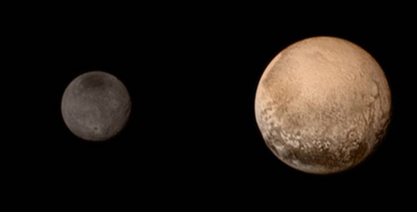 Pluto and her darker twin, Charon. (NASA New Horizons)