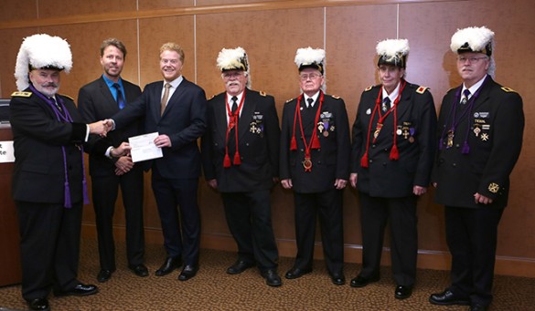 Alex and Anthony with a number of men in masonic uniforms